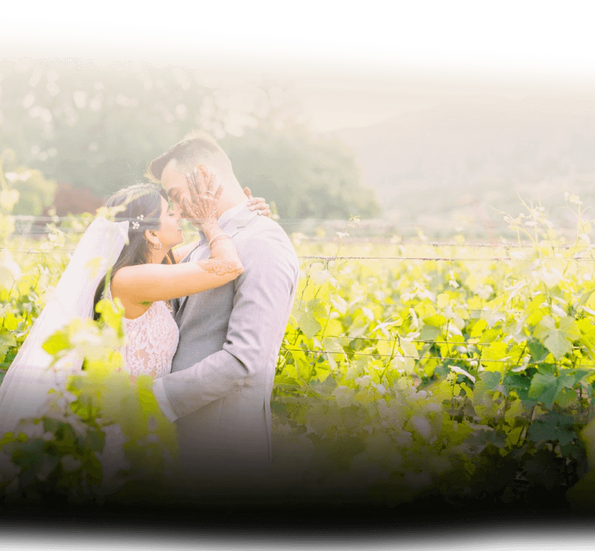 Couple Holding Each Other in Wedding Gown